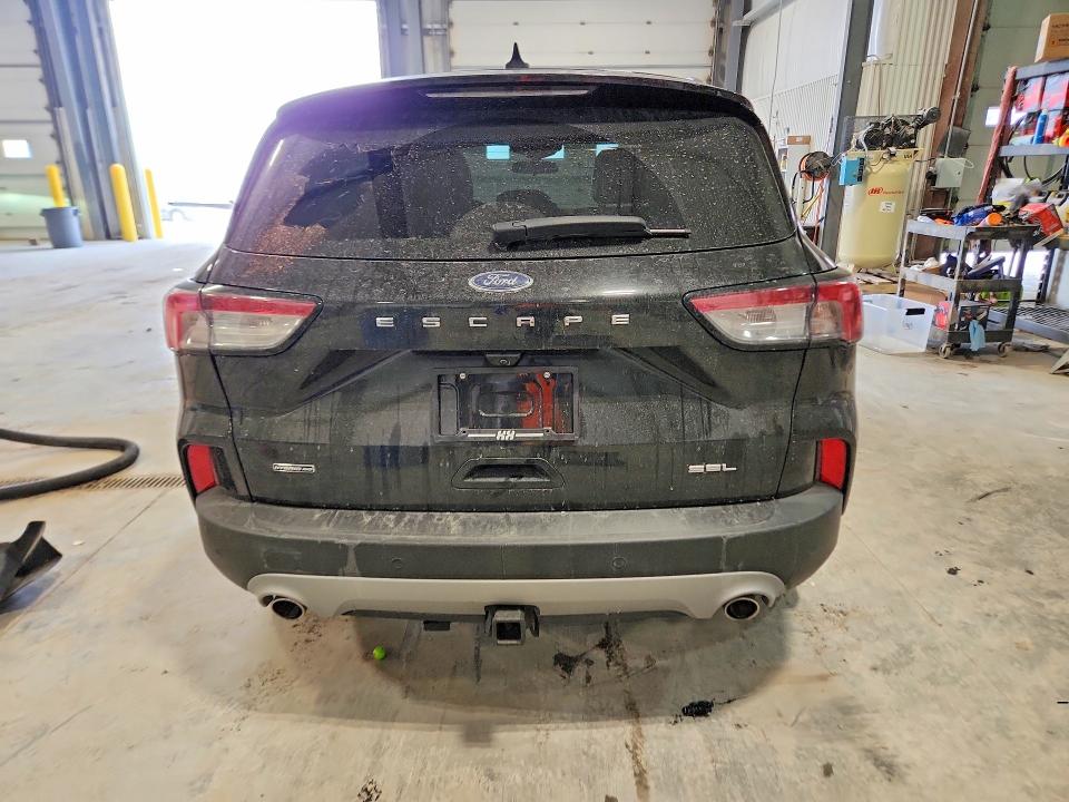 Photo 6 from auction – 2021 FORD ESCAPE with VIN 1FMCU0CZ8MUB16911