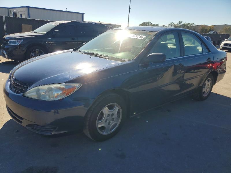 TOYOTA CAMRY LE 2003 with VIN 4T1BF30KX3U050018 - Photo from auction