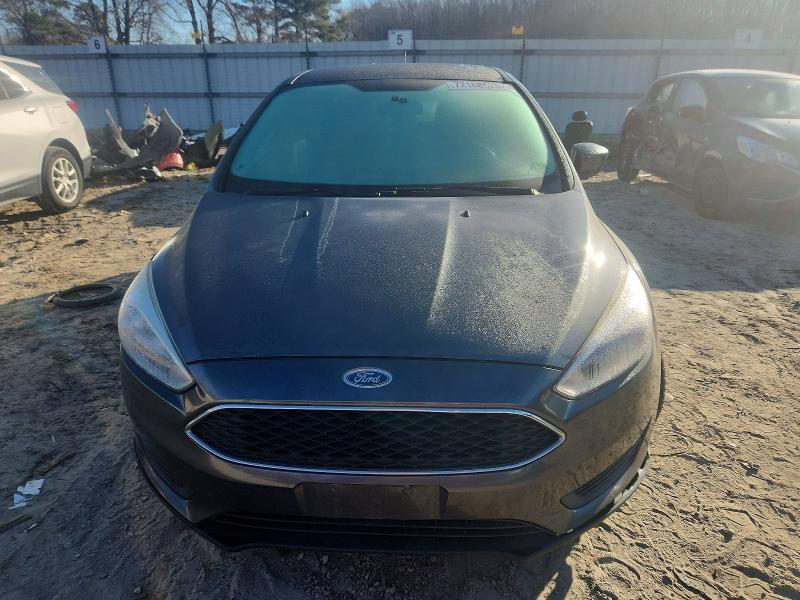 Photo 5 from auction – 2018 FORD FOCUS with VIN 1FADP3F20JL285358