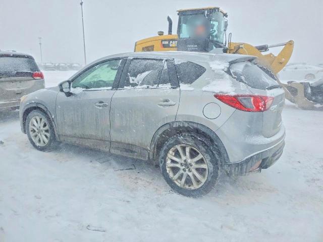 Photo 2 from auction – 2014 MAZDA CX-5 GT with VIN JM3KE4DYXE0302489