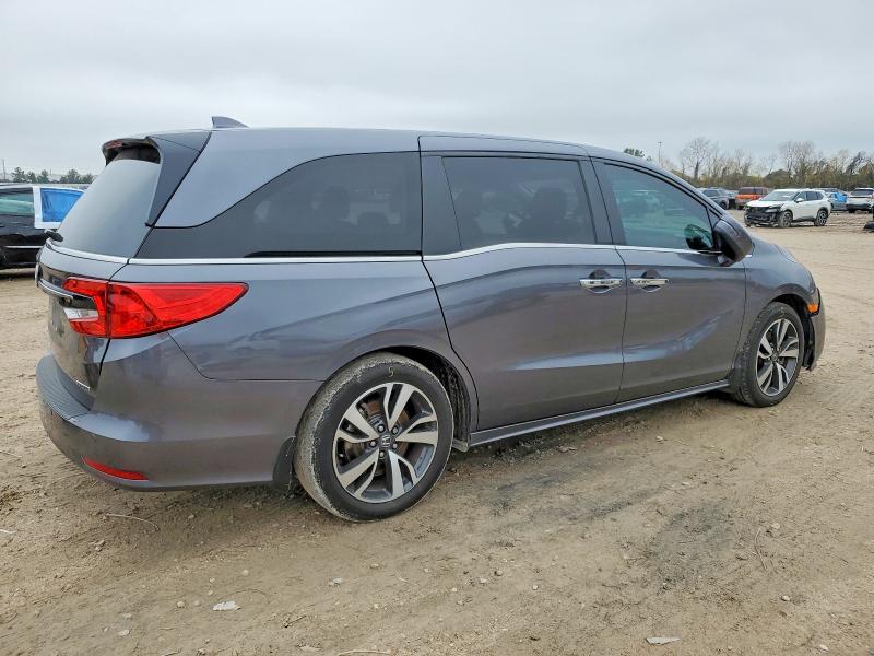 Photo 3 from auction – 2023 HONDA ODYSSEY TO with VIN 5FNRL6H81PB045701
