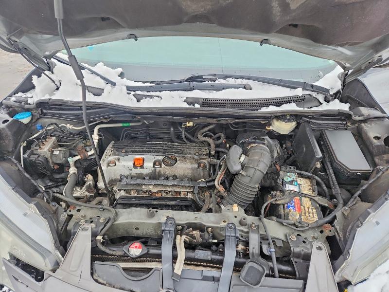 Photo 11 from auction – 2012 HONDA CR-V with VIN 2HKRM4H58CH607662
