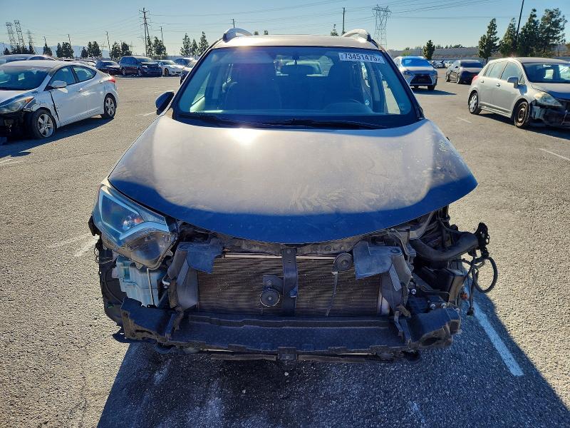 Photo 5 from auction – 2016 TOYOTA RAV4 XLE with VIN 2T3WFREV6GW235512