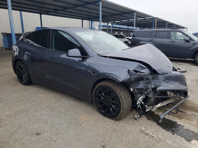 Photo 4 from auction – 2023 TESLA MODEL Y with VIN 7SAYGDEEXPF644338