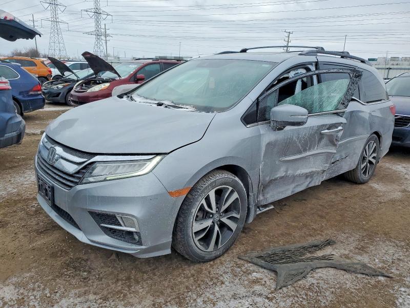 HONDA ODYSSEY 2018 with VIN 5FNRL6H91JB002833 - Photo from auction