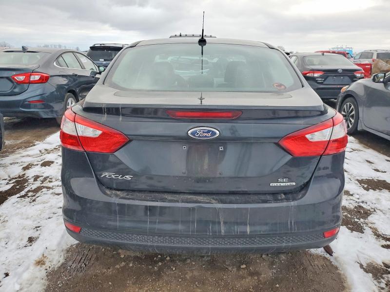 Photo 6 from auction – 2014 FORD FOCUS with VIN 1FADP3F21EL269174