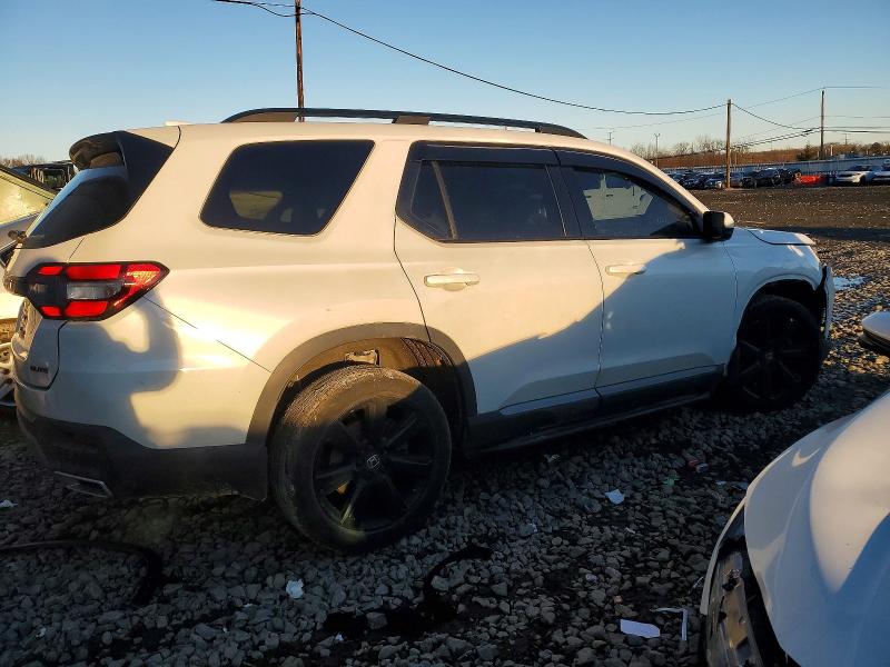 Photo 3 from auction – 2023 HONDA PILOT ELIT with VIN 5FNYG1H89PB004669
