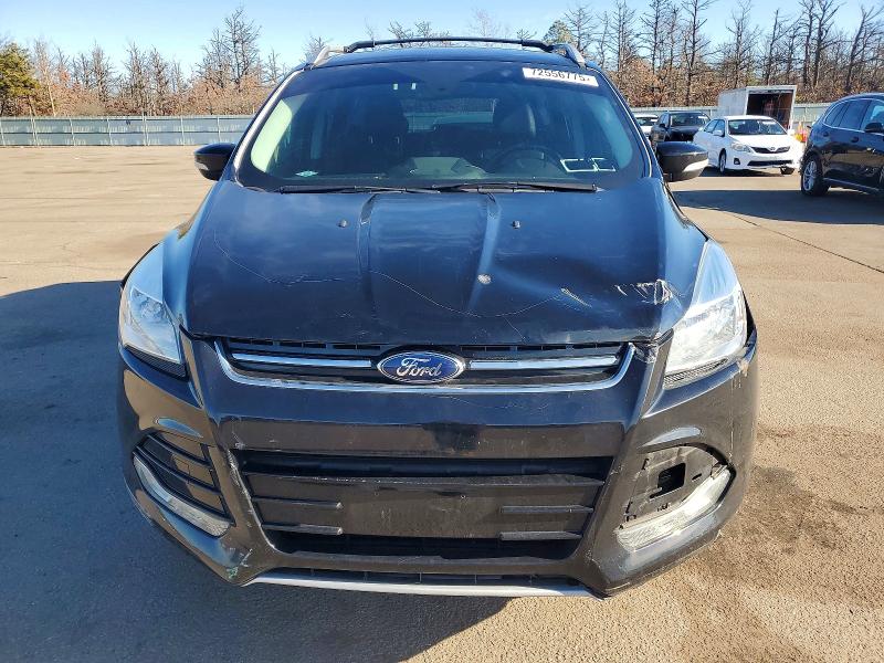 Photo 5 from auction – 2016 FORD ESCAPE TIT with VIN 1FMCU9JX9GUB50804