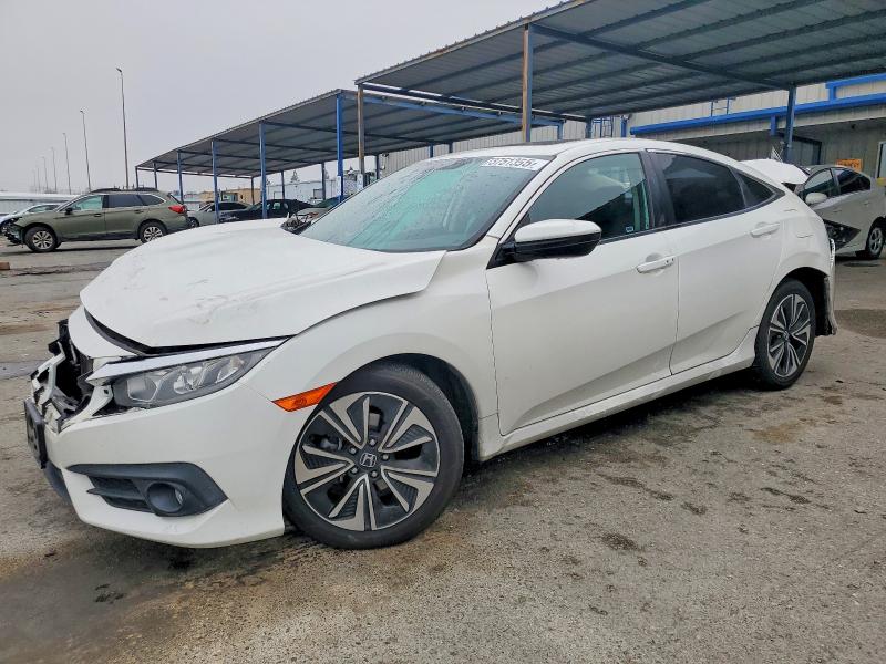 HONDA CIVIC EX 2017 with VIN 19XFC1F30HE213610 - Photo from auction