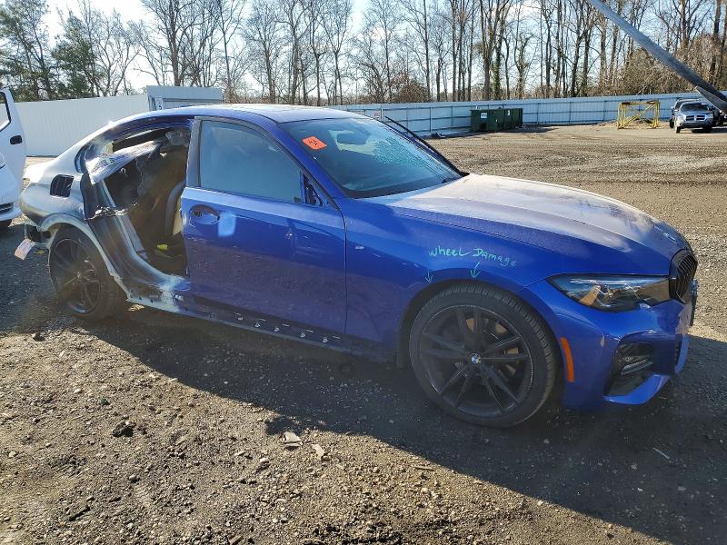 Photo 4 from auction – 2022 BMW 330XI with VIN 3MW5R7J06N8C25648