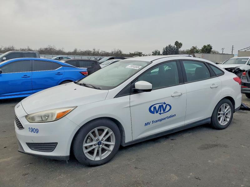 FORD FOCUS 2018 with VIN 1FADP3F29JL211484 - Photo from auction