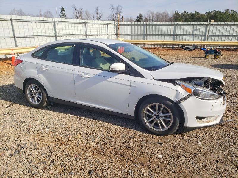 Photo 4 from auction – 2015 FORD FOCUS SE with VIN 1FADP3F24FL214817