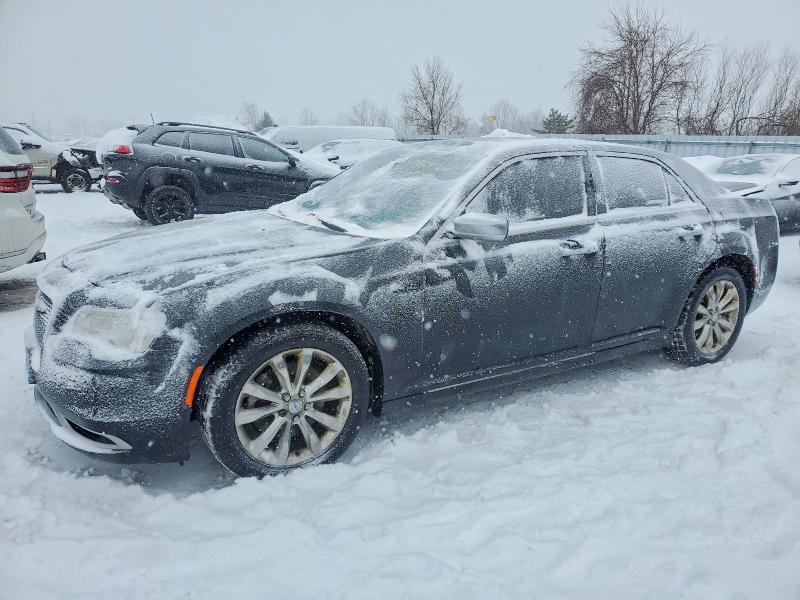 CHRYSLER 300C PLATI 2015 with VIN 2C3CCASGXFH864583 - Photo from auction