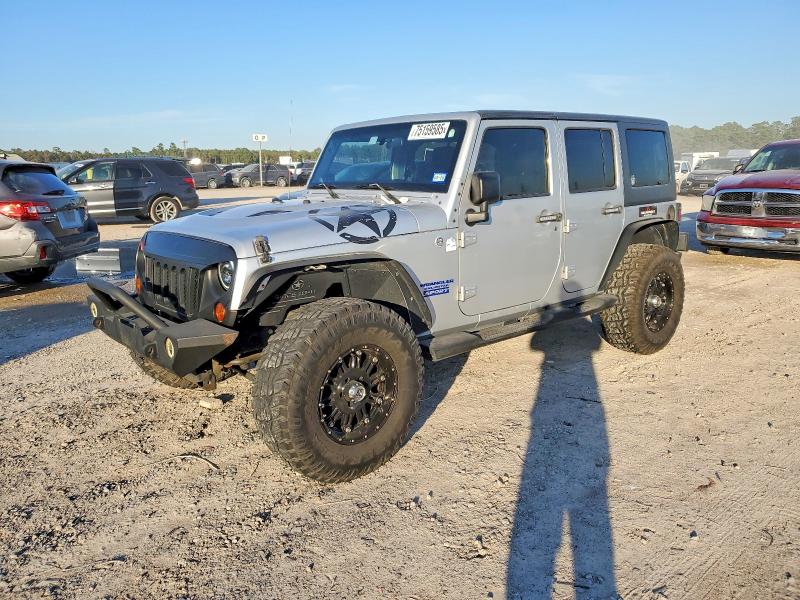 JEEP WRANGLER U 2011 with VIN 1J4HA3H1XBL586331 - Photo from auction