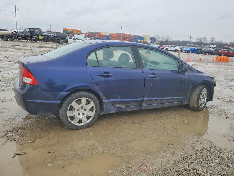 Photo 3 from auction – 2010 HONDA CIVIC LX with VIN 19XFA1F5XAE029790
