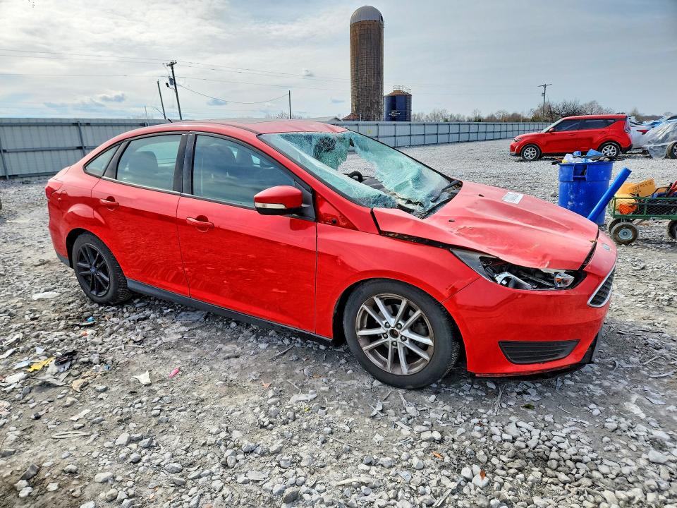 Photo 4 from auction – 2016 FORD FOCUS with VIN 1FADP3F20GL338228
