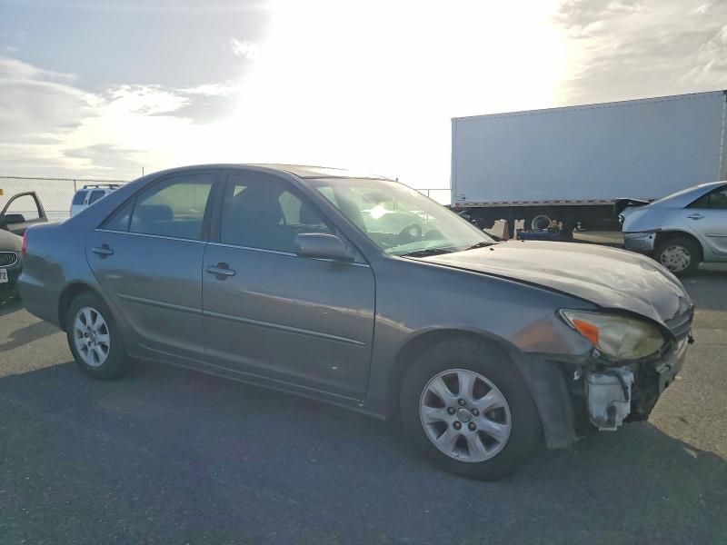Photo 4 from auction – 2003 TOYOTA CAMRY LE with VIN JTDBF32K030138083