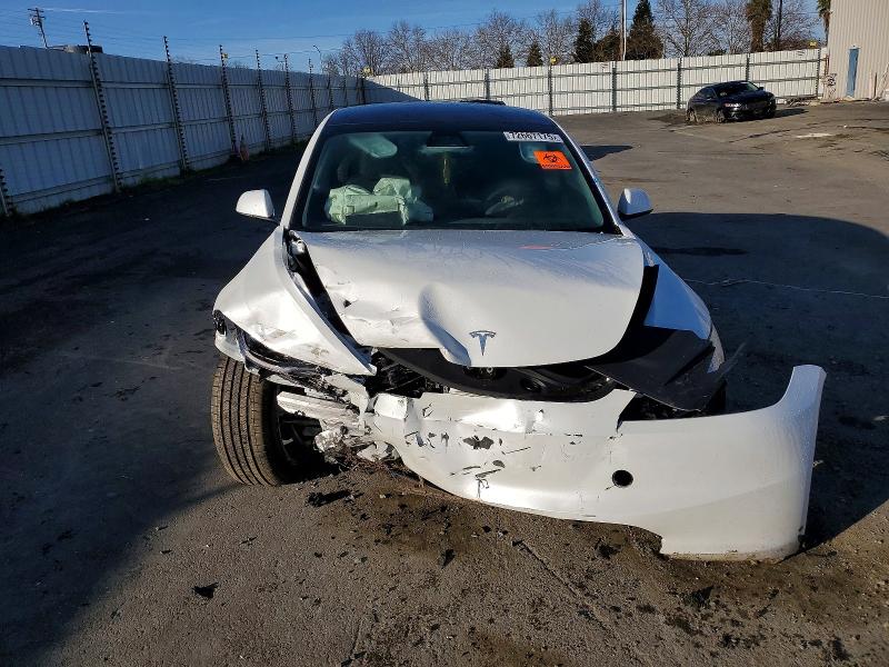 Photo 5 from auction – 2025 TESLA MODEL 3 with VIN 5YJ3E1EA8SF075460