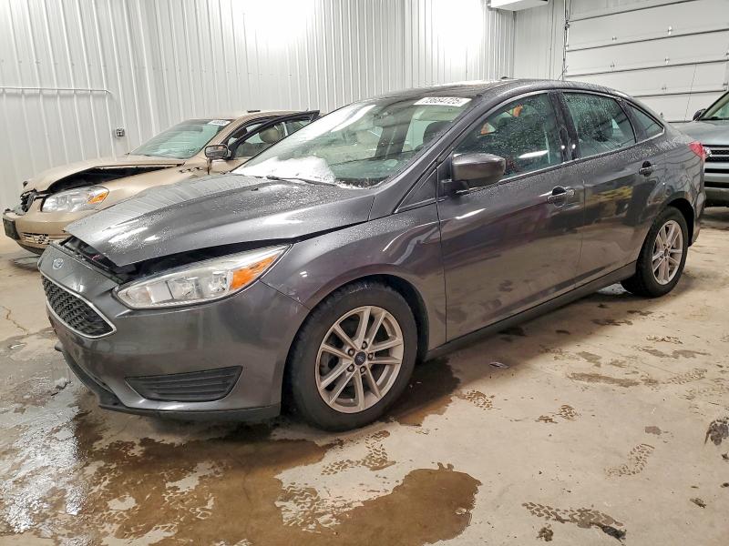 FORD FOCUS SE 2018 with VIN 1FADP3F24JL328602 - Photo from auction