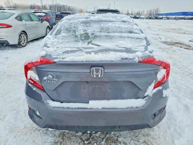 Photo 6 from auction – 2018 HONDA CIVIC LX with VIN 19XFC2F53JE033079