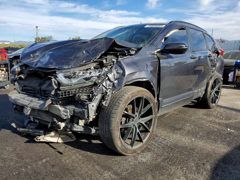 HONDA CRV 2017 with VIN 7FARW1H9XHE025925 - Photo from auction