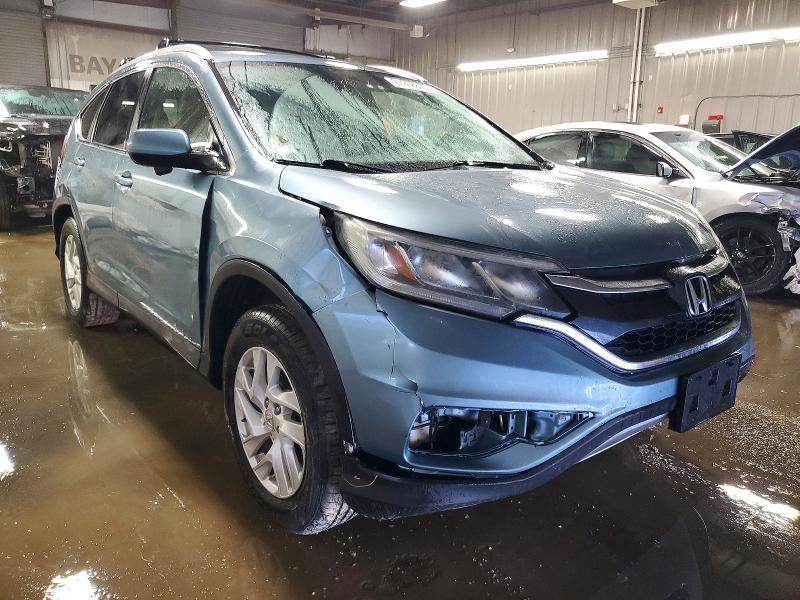 Photo 4 from auction – 2015 HONDA CR-V with VIN 2HKRM3H5XFH532641