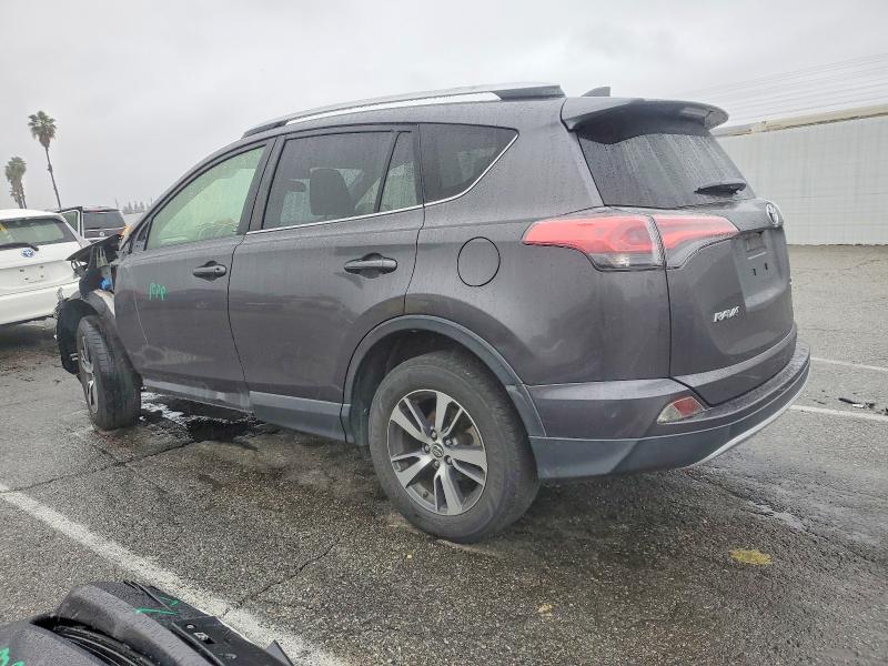 Photo 2 from auction – 2016 TOYOTA RAV4 XLE with VIN JTMWFREV2GJ072632