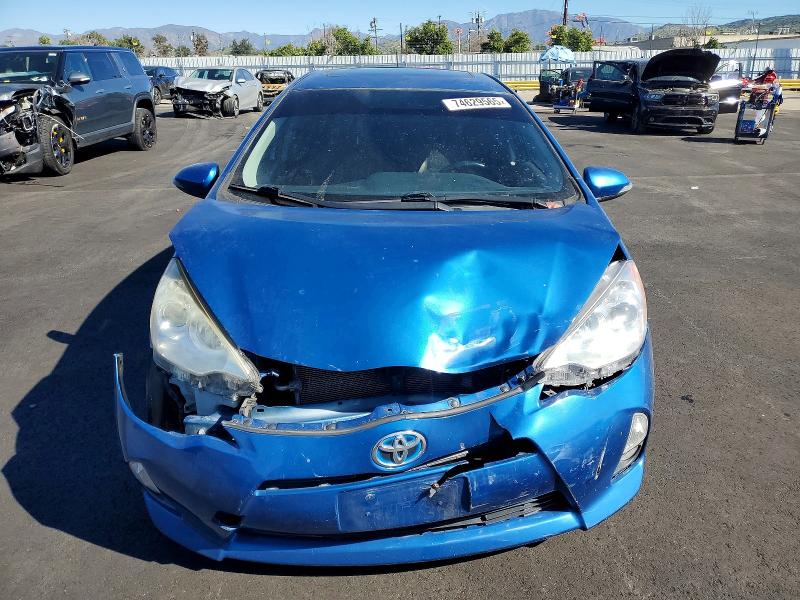 Photo 5 from auction – 2014 TOYOTA PRIUS C with VIN JTDKDTB39E1059295
