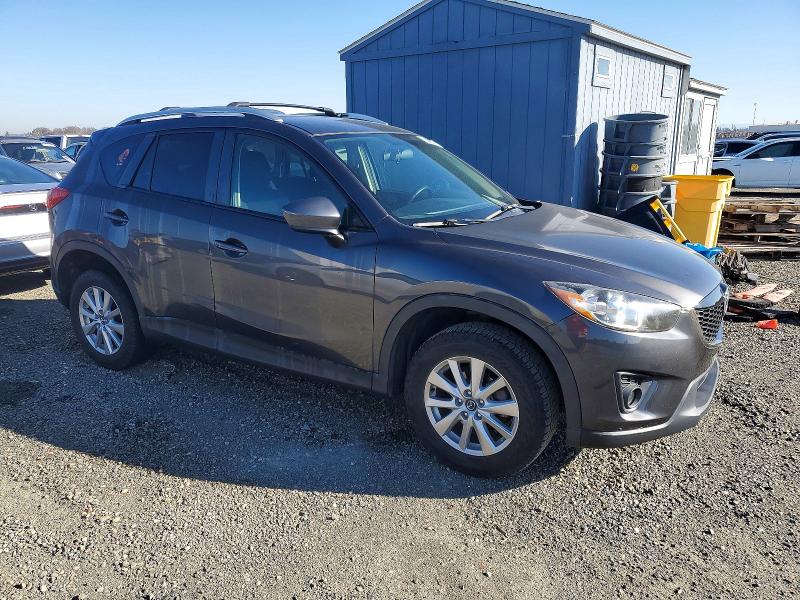 Photo 4 from auction – 2015 MAZDA CX-5 with VIN JM3KE4CY1F0455796