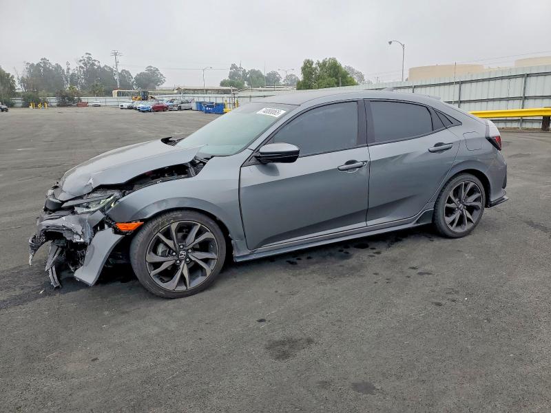 HONDA CIVIC SPOR 2019 with VIN SHHFK7H49KU405703 - Photo from auction