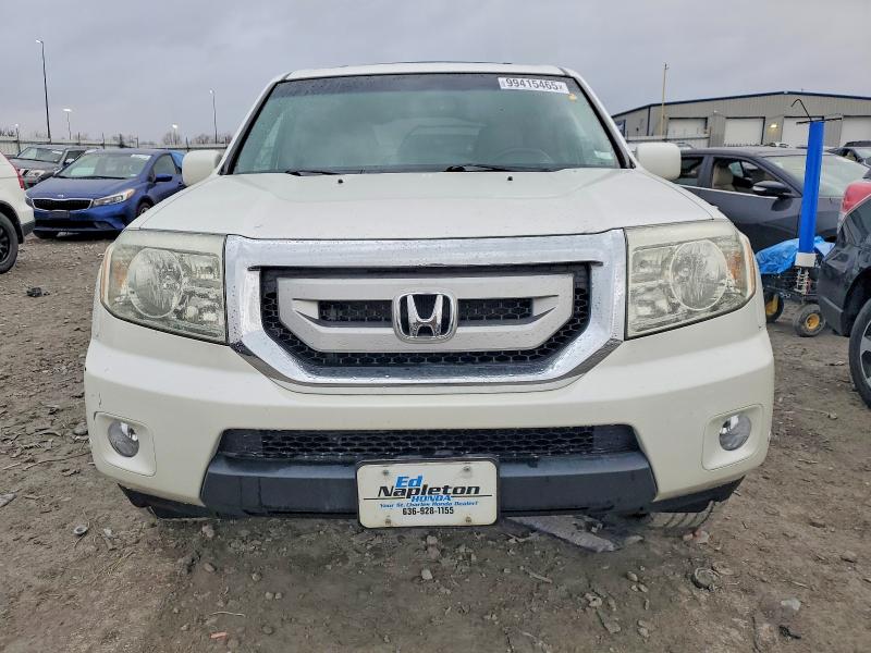 Фото 5 с аукциона – 2011 HONDA PILOT TOUR с VIN 5FNYF4H91BB018362