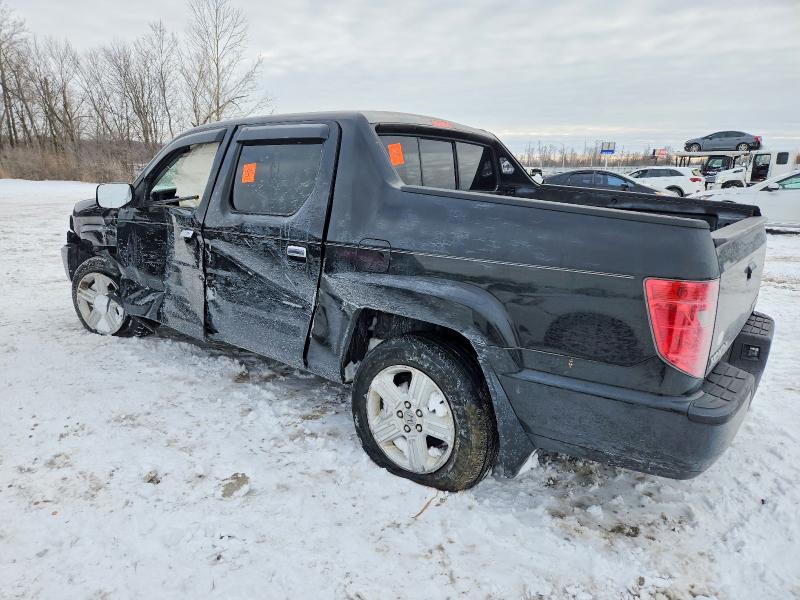Photo 2 from auction – 2010 HONDA RIDGELINE with VIN 5FPYK1F50AB012603