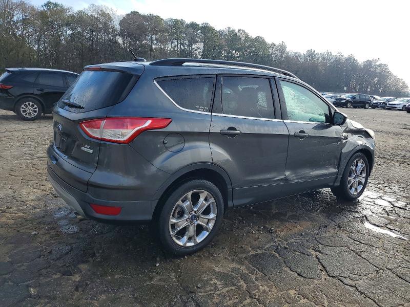 Photo 3 from auction – 2016 FORD ESCAPE SE with VIN 1FMCU0GX0GUC34495
