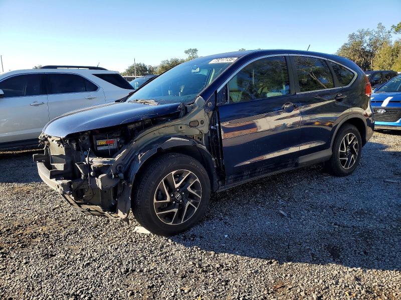 HONDA CR-V SE 2016 with VIN 5J6RM4H43GL090323 - Photo from auction