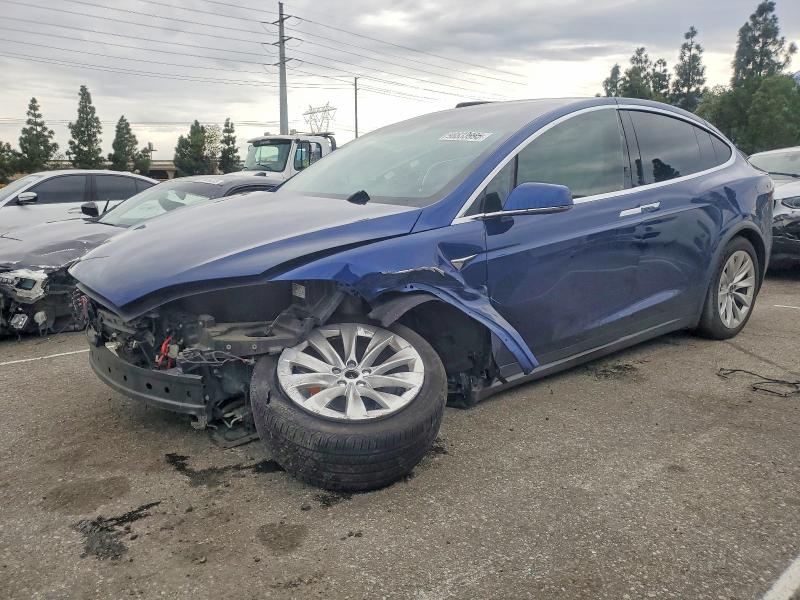 TESLA MODEL X 2019 with VIN 5YJXCAE28KF184856 - Photo from auction