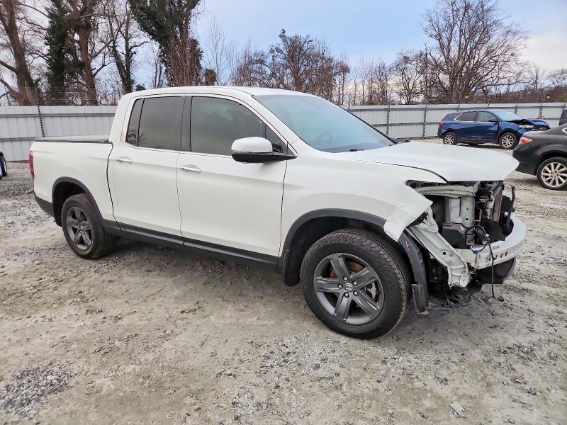 Photo 4 from auction – 2022 HONDA RIDGELINE with VIN 5FPYK3F70NB025824