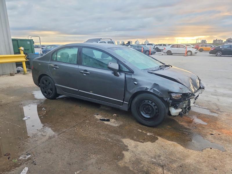Photo 4 from auction – 2011 HONDA CIVIC LX with VIN 2HGFA1F54BH302018