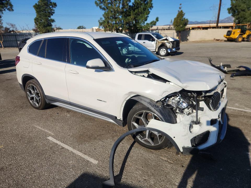 Photo 4 from auction – 2017 BMW X1 with VIN WBXHU7C31H5H33362
