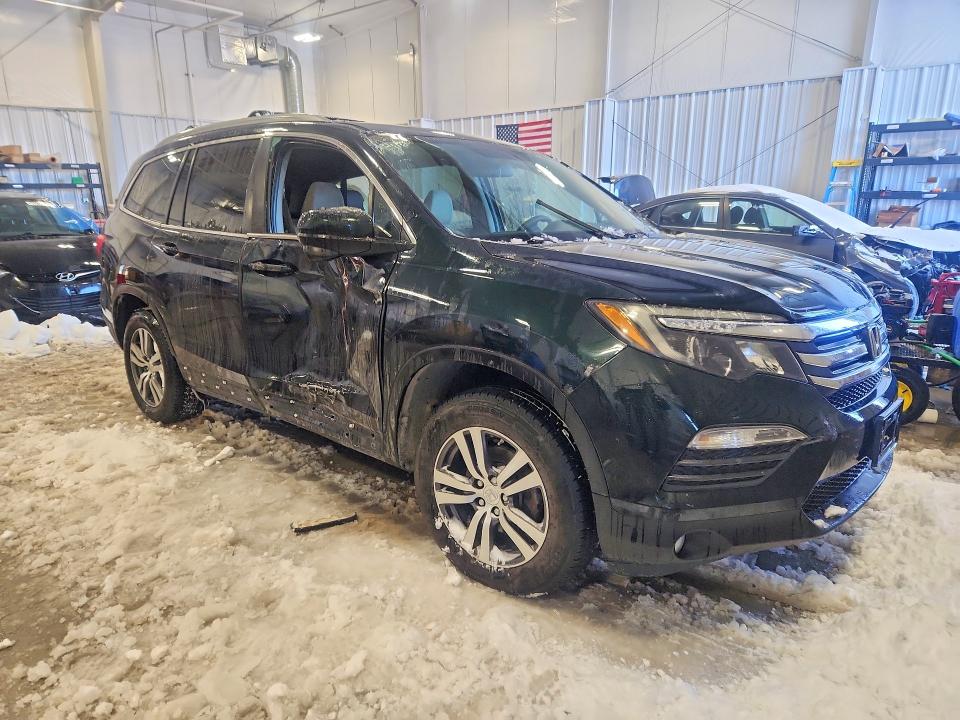 Photo 4 from auction – 2016 HONDA PILOT EX with VIN 5FNYF6H39GB003221
