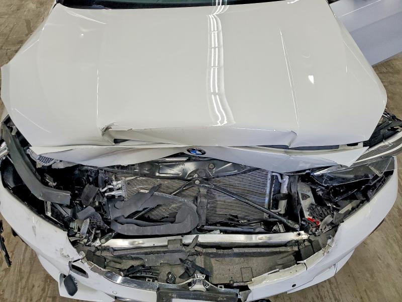 Photo 11 from auction – 2021 BMW 228XI with VIN WBA73AK02M7H41370