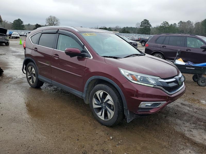 Photo 4 from auction – 2015 HONDA CR-V TOURI with VIN 5J6RM3H94FL014002