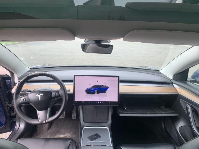 Photo 9 from auction – 2022 TESLA MODEL 3 with VIN 5YJ3E1EA6NF371937