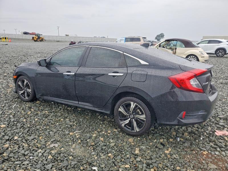 Photo 2 from auction – 2017 HONDA CIVIC TOUR with VIN 19XFC1F96HE212529
