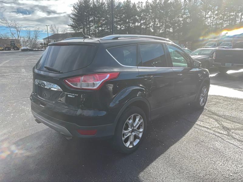 Photo 4 from auction – 2016 FORD ESCAPE TIT with VIN 1FMCU9J99GUC90627