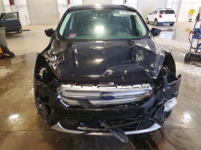 Photo 5 from auction – 2017 FORD ESCAPE SE with VIN 1FMCU9G98HUE36525