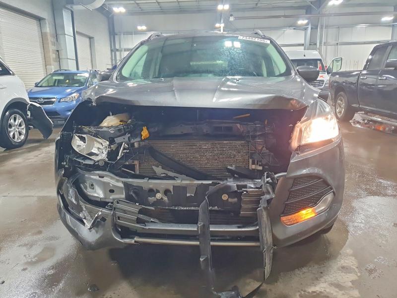 Photo 5 from auction – 2016 FORD ESCAPE with VIN 1FMCU9G9XGUA67567