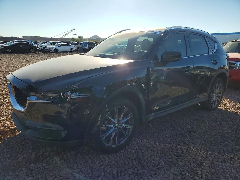 MAZDA CX-5 2019 with VIN JM3KFADM0K1582860 - Photo from auction