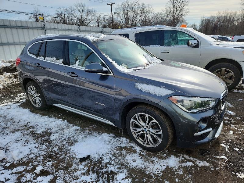 Photo 4 from auction – 2016 BMW X1 with VIN WBXHT3Z3XG4A50812