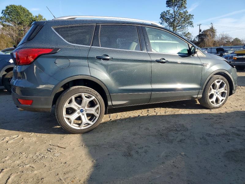 Photo 3 from auction – 2019 FORD ESCAPE TIT with VIN 1FMCU0J94KUC18609