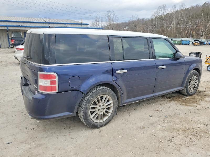 Photo 3 from auction – 2016 FORD FLEX with VIN 2FMGK5C89GBA09808